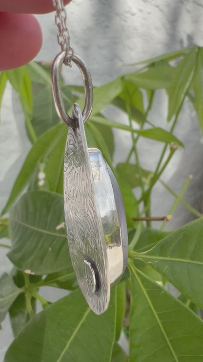 Live view of artisan crafted agate sterling silver pendant showing natural stone patterns