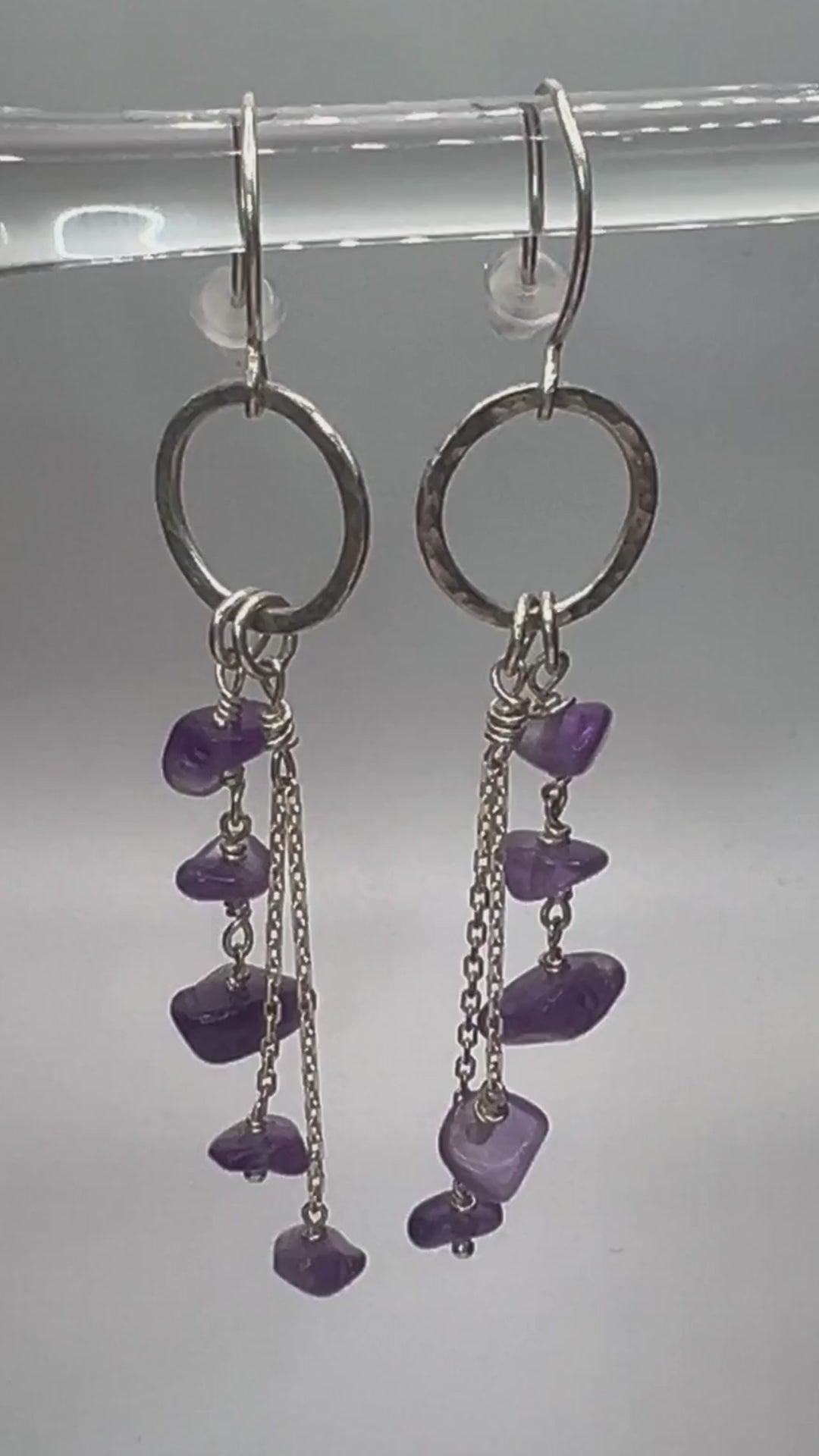 Live view of lightweight amethyst drop earrings showing purple gemstone beads
and chain
