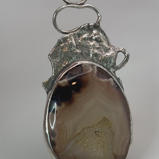 Live view of druzy agate statement pendant open-back design with sterling silver accent